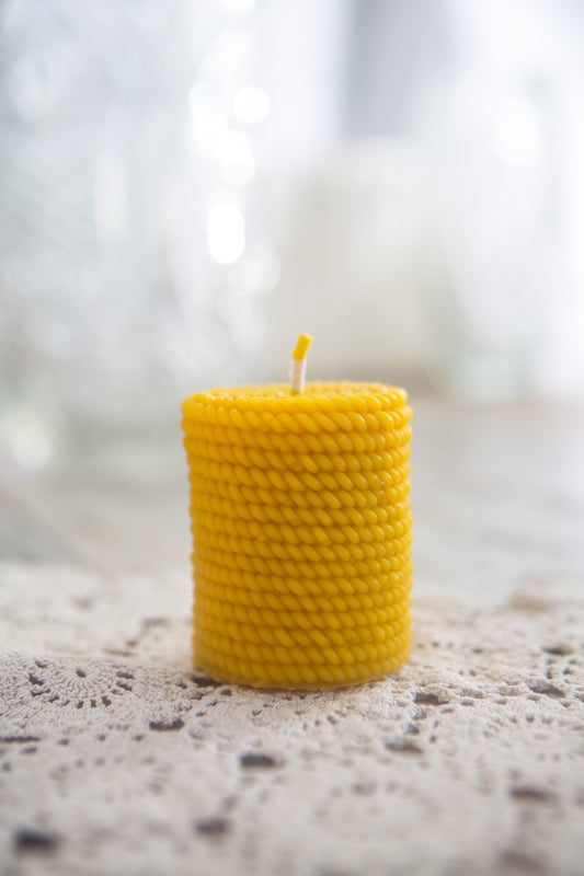 Cylinder with string beeswax